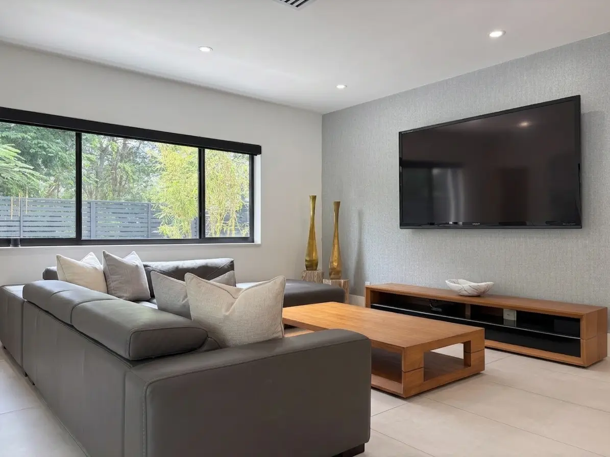 Family room from the open floor plan looking toward the canopy window