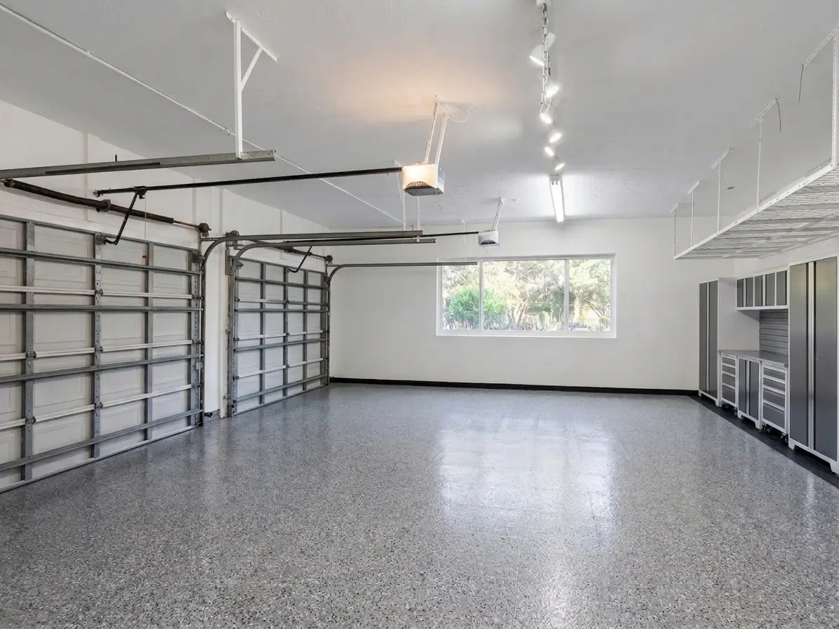 Finished three-car garage with epoxy floors